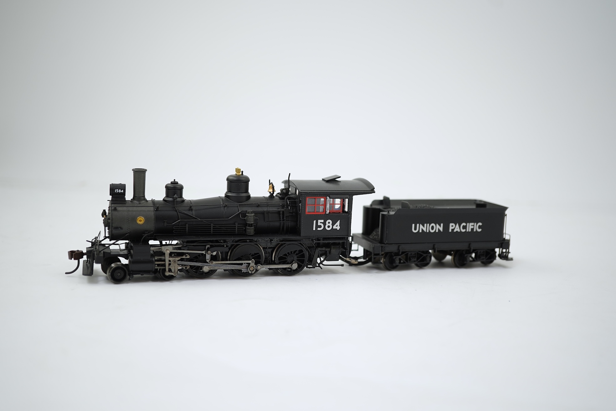 A boxed HO gauge Spectrum by Bachmann model (82303) of Baldwin, 1584, 4-6-0 locomotive with bogie tender, powered for two rail operation.